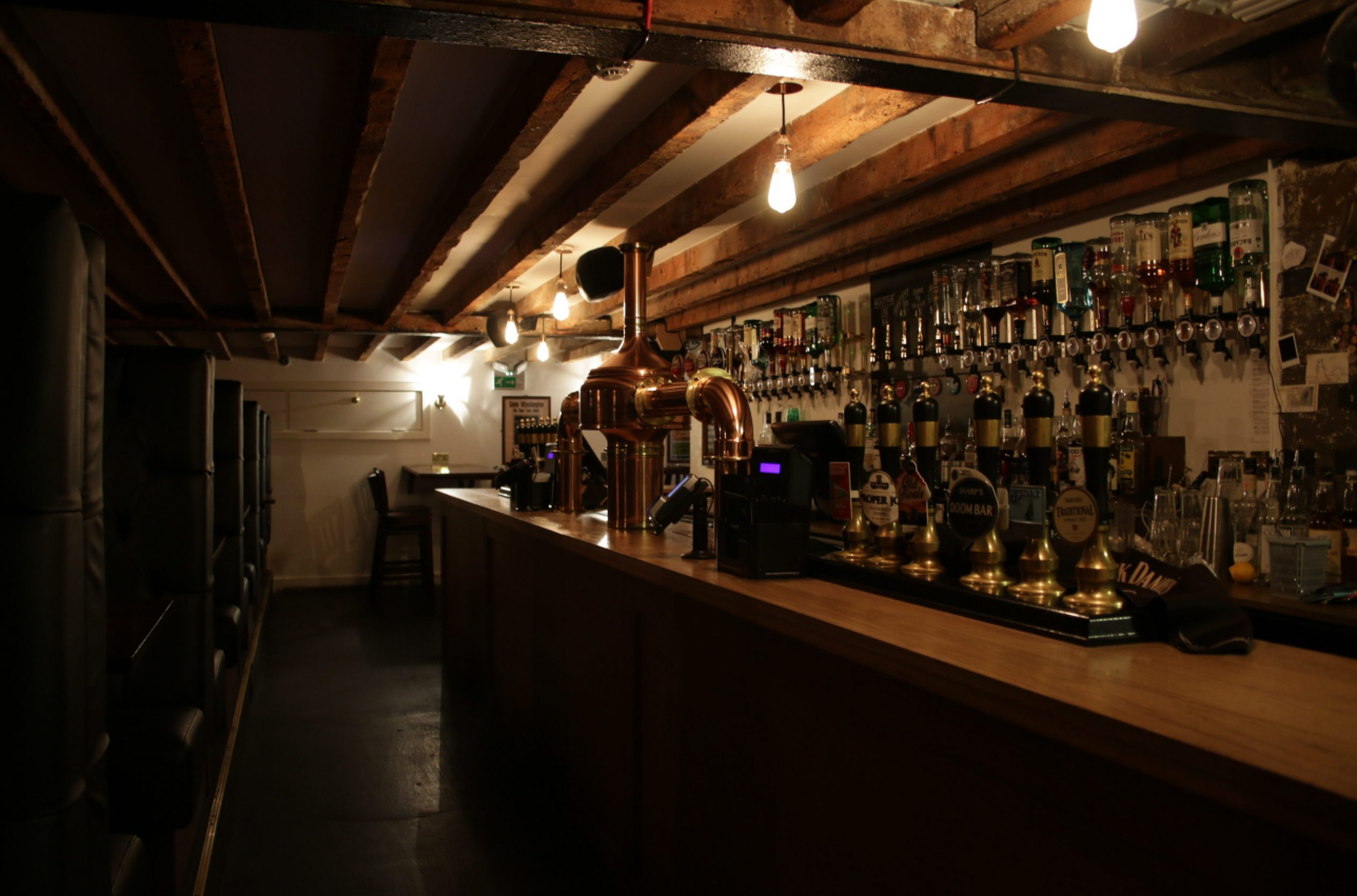 Cozy Stocks Bar in New Cross Inn, perfect for casual receptions and gatherings.