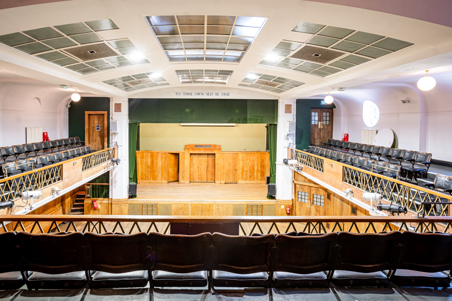 Main Hall in Conway Hall: tiered seating, ideal for conferences and workshops.