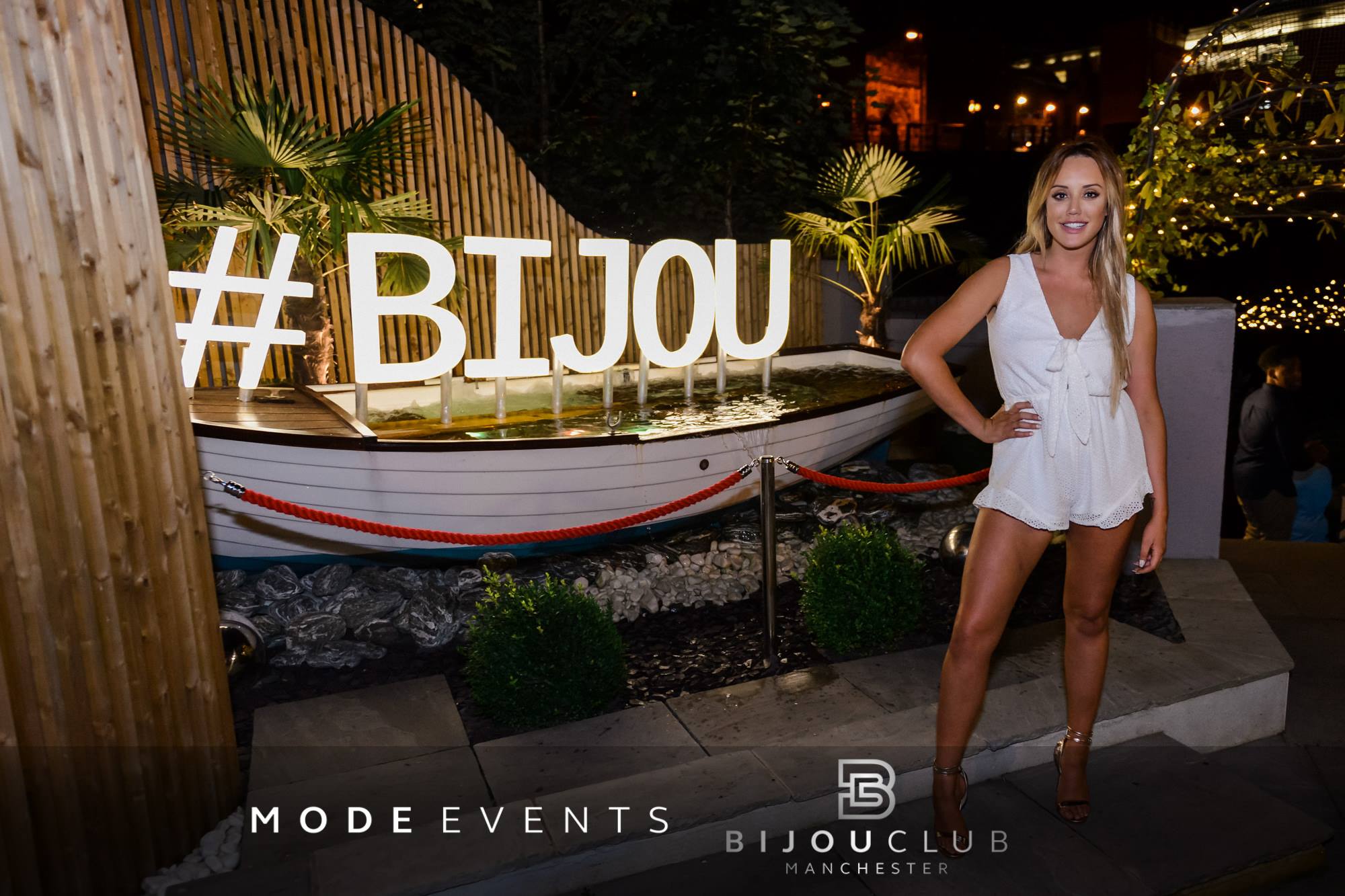 Vibrant outdoor event setup at Bijou Club with stylish lighting and networking vibe.