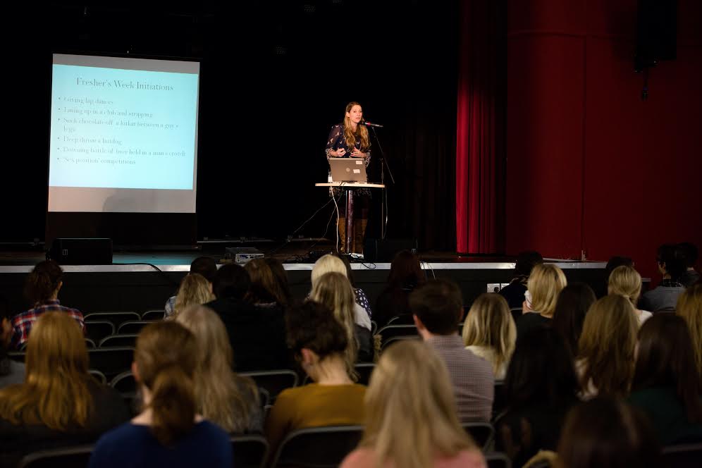 Speaker engaging audience at Stanley Theatre conference in Liverpool, great for networking and learning.