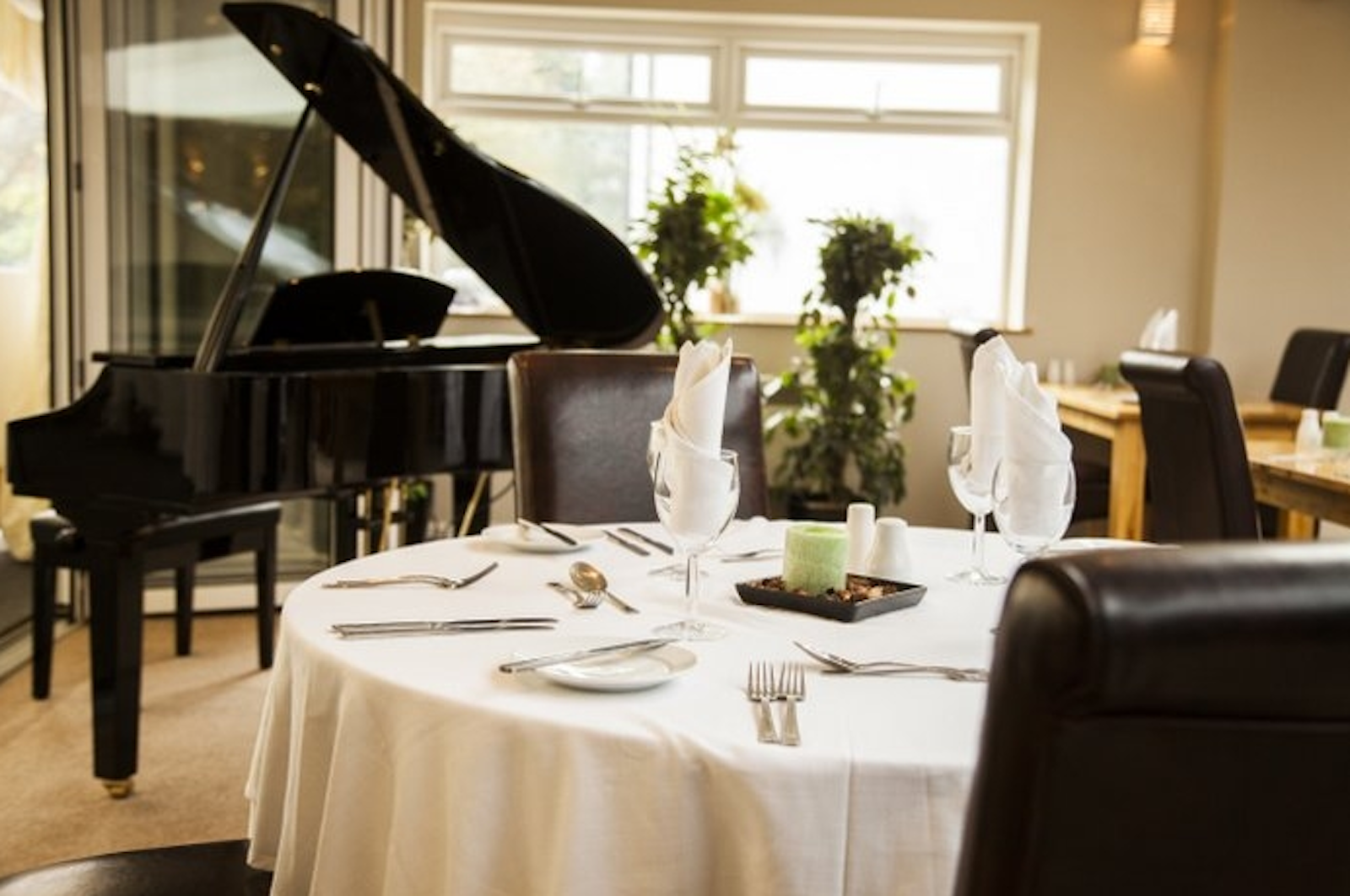 Elegant dining table in Orchard Suite, The Limes Lodge, perfect for upscale events.