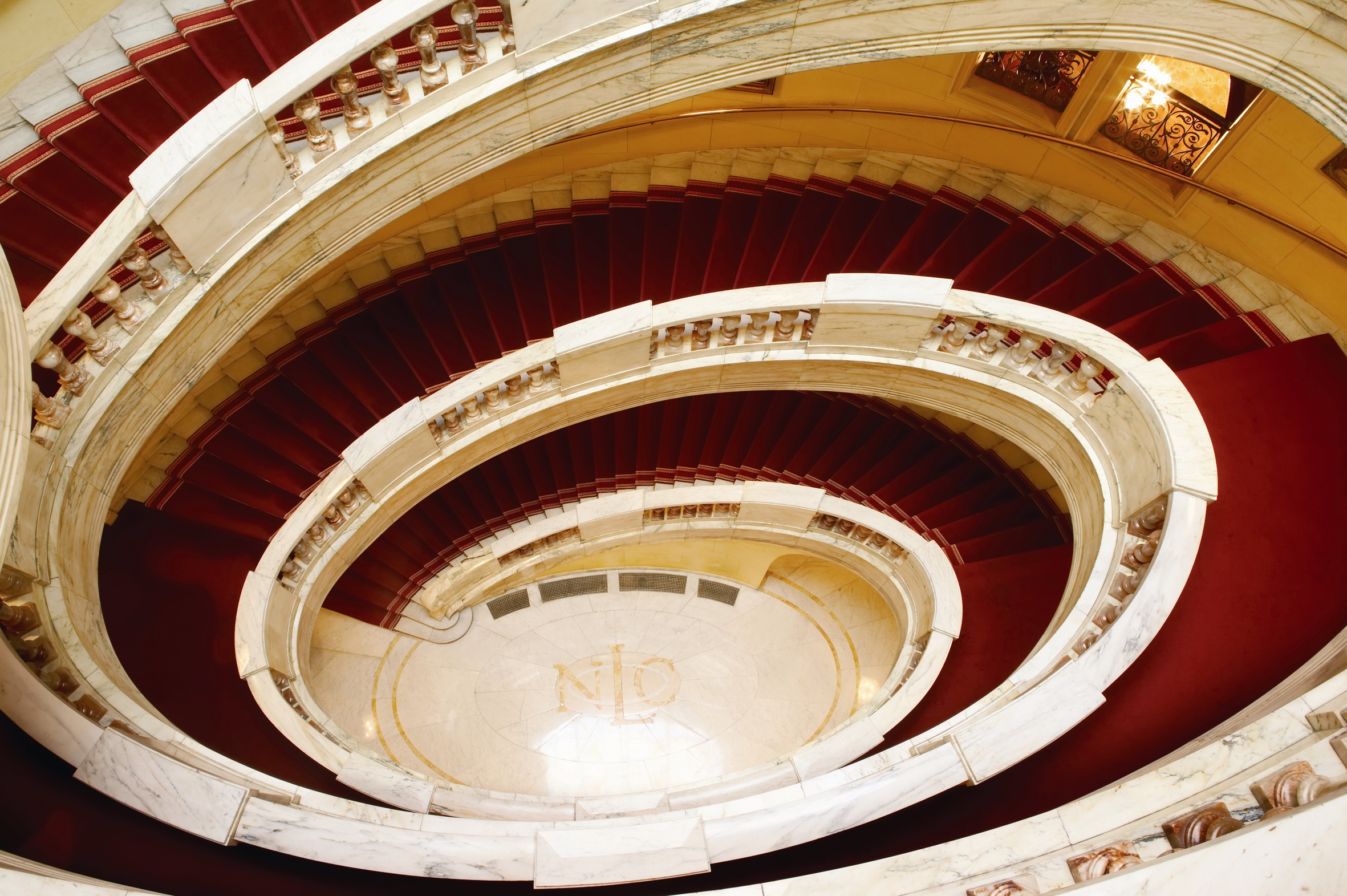Elegant spiral staircase in River Room, perfect for upscale weddings and corporate events.