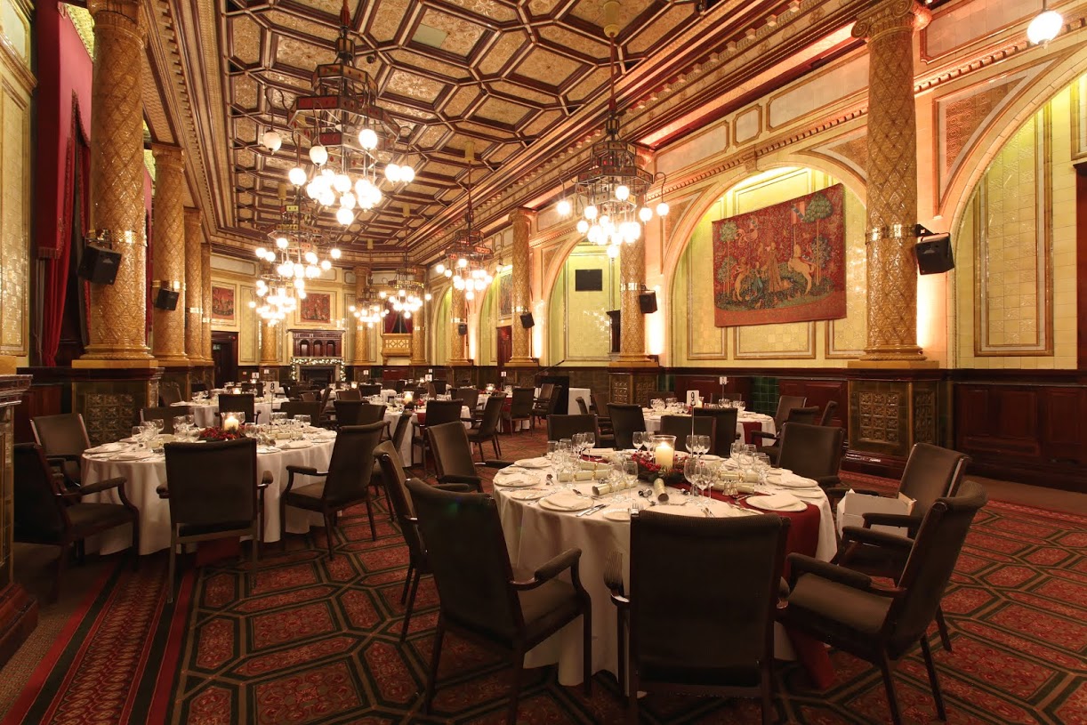 Elegant Whitehall Suite banquet hall with ornate ceiling, perfect for upscale events.