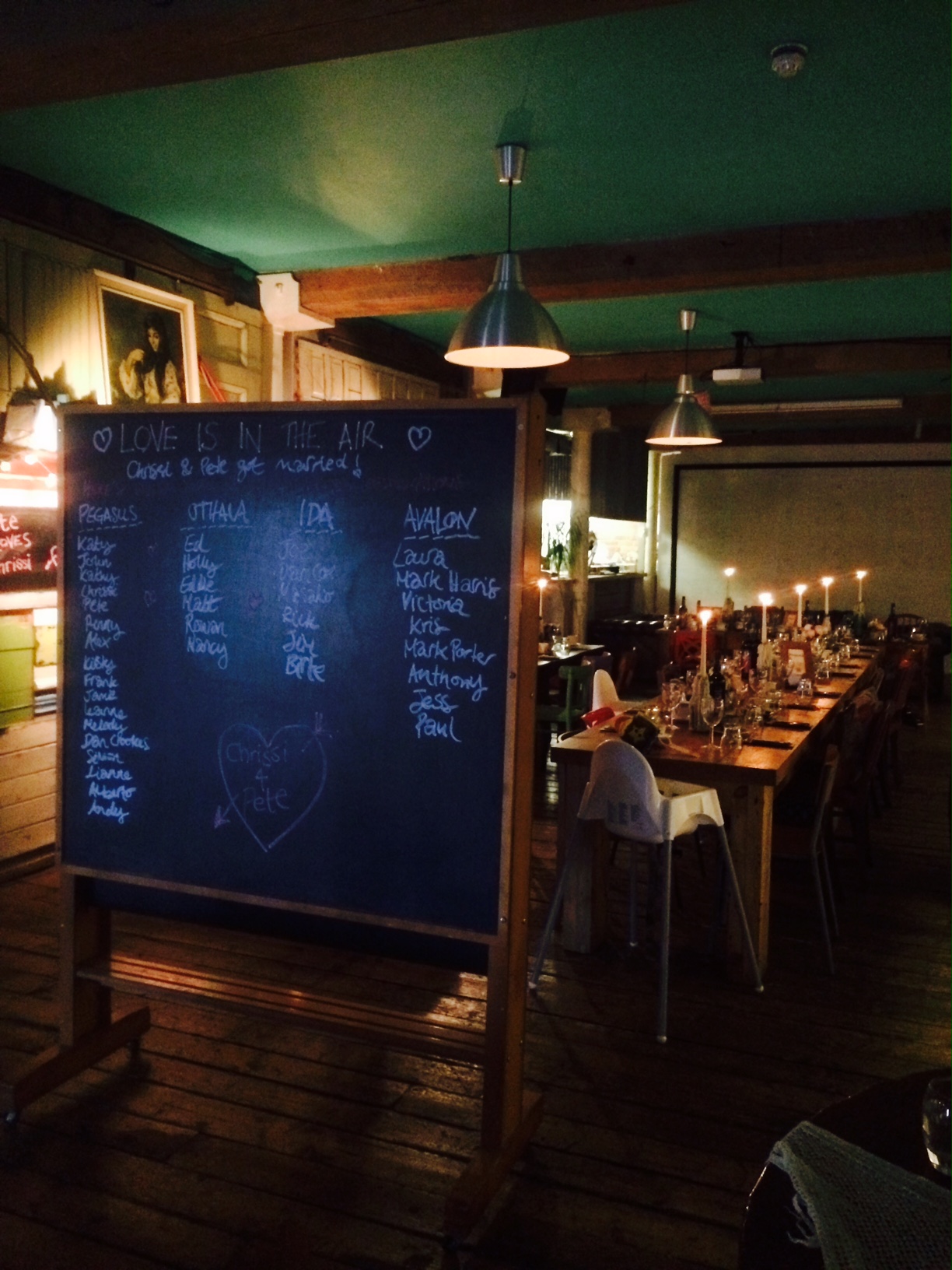 Cozy Baltic Social event space with candles, ideal for weddings and intimate gatherings.