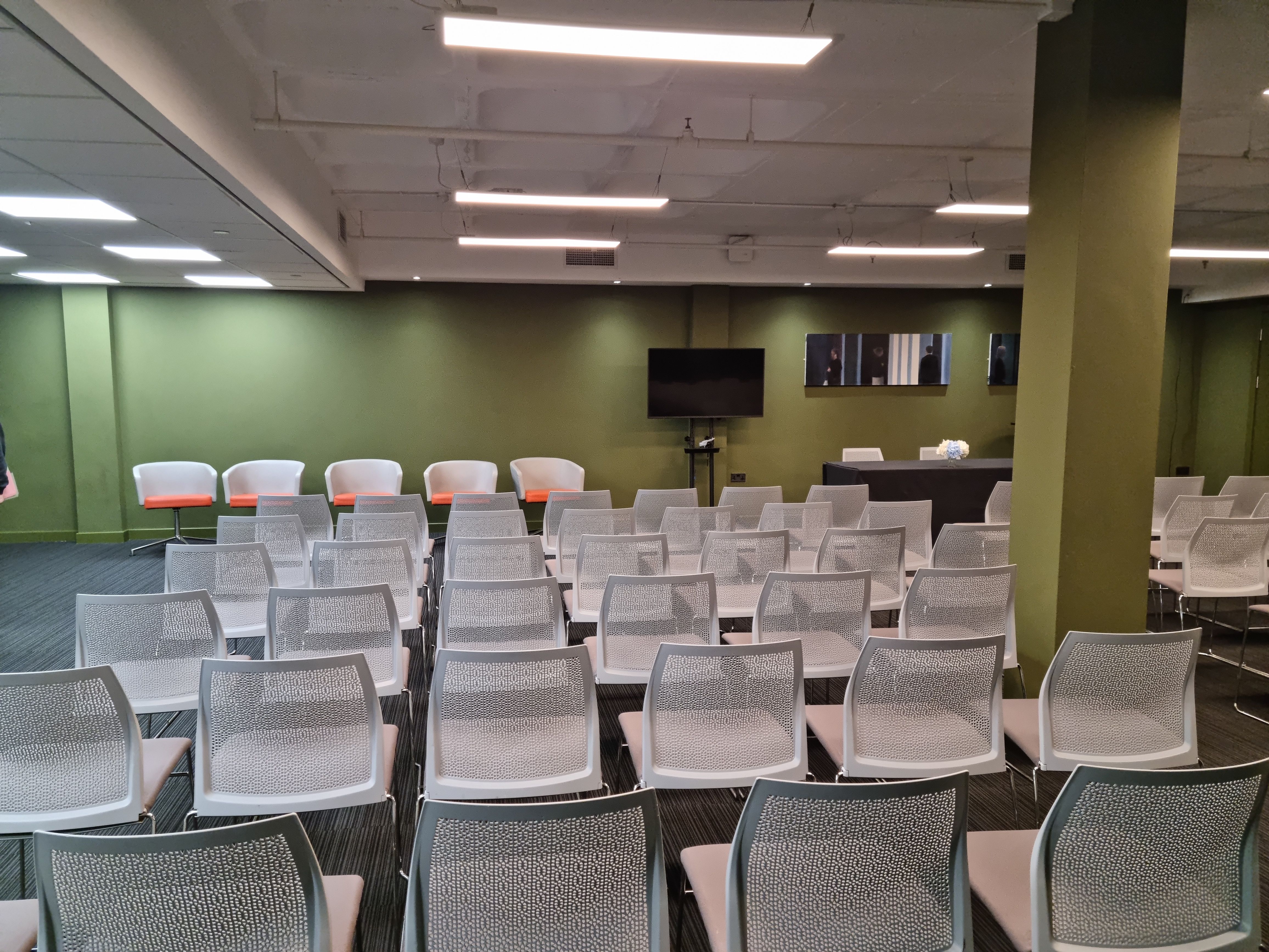 Versatile meeting space with modern chairs for workshops at Executive Centre, Business Design Centre.
