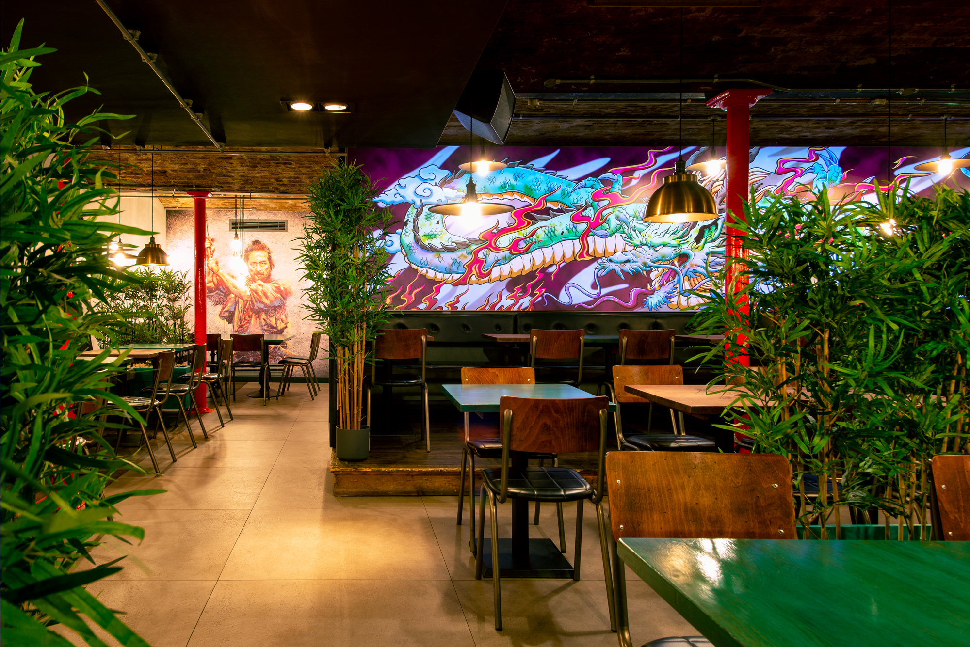 "Yuu Kitchen at ICE BAR London: vibrant event space with greenery for creative gatherings."