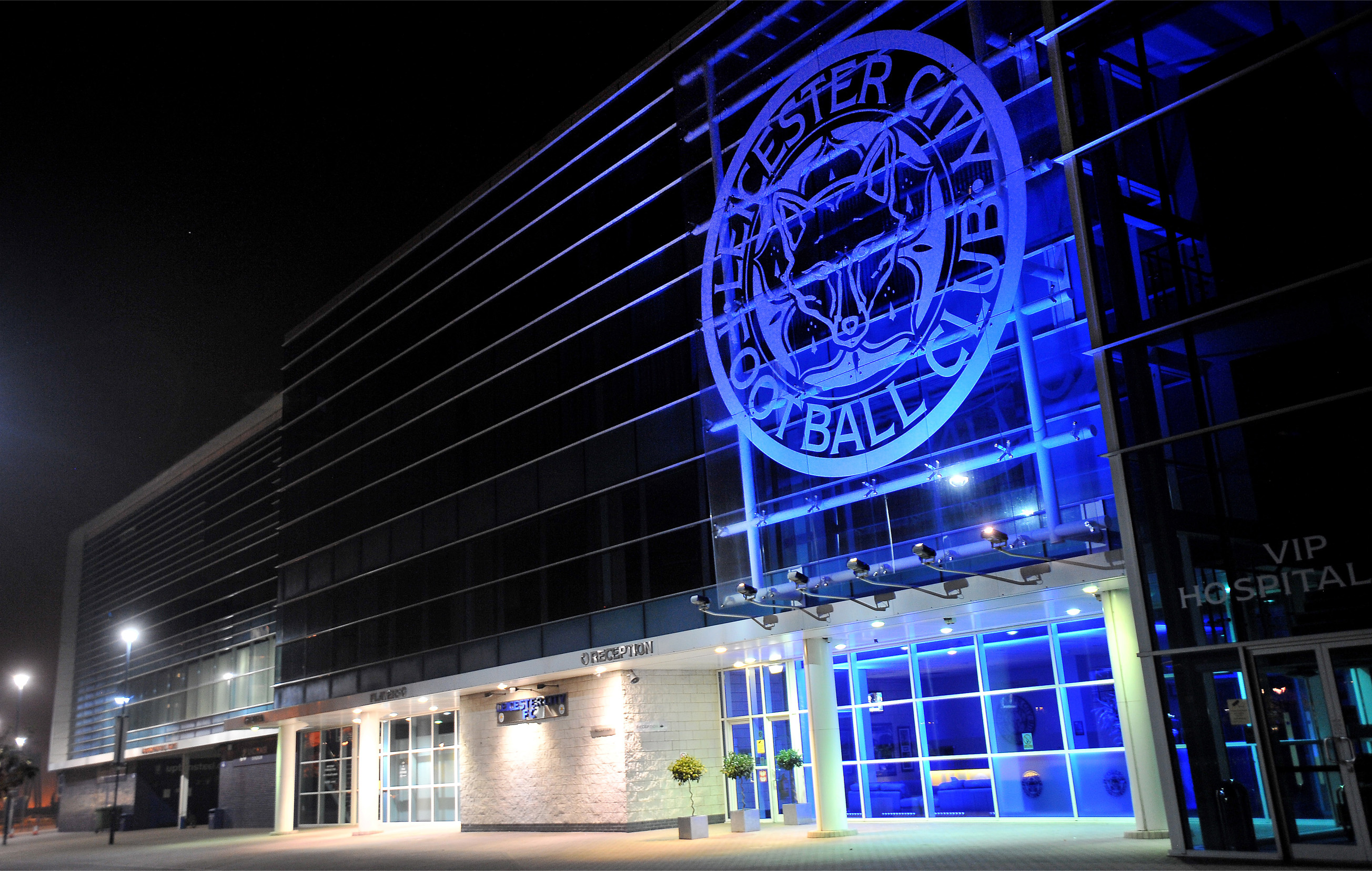 Walkers Hall at King Power Stadium, modern venue with blue lighting for events.