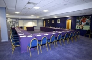 Rowley Suite at King Power Stadium: elegant meeting room for workshops and strategic meetings.