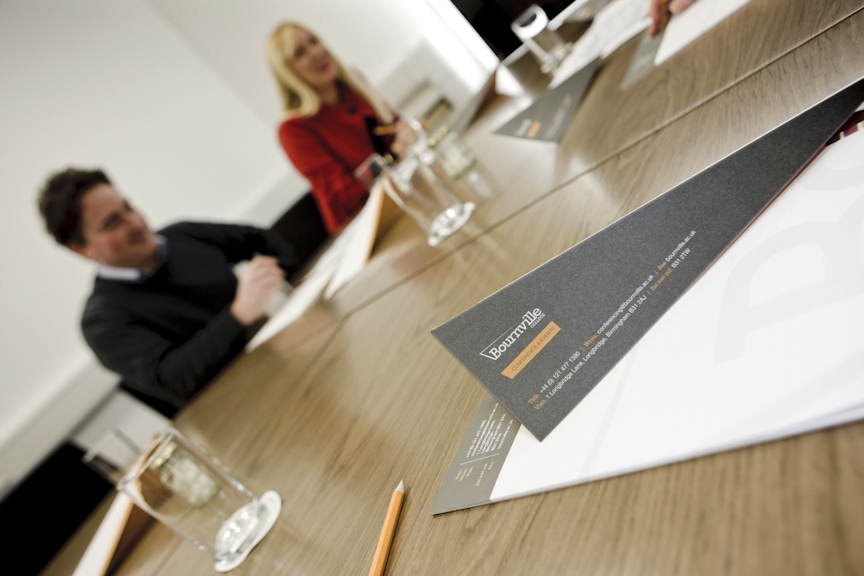 Cofton Suite meeting setup with sleek table, ideal for conferences and events.