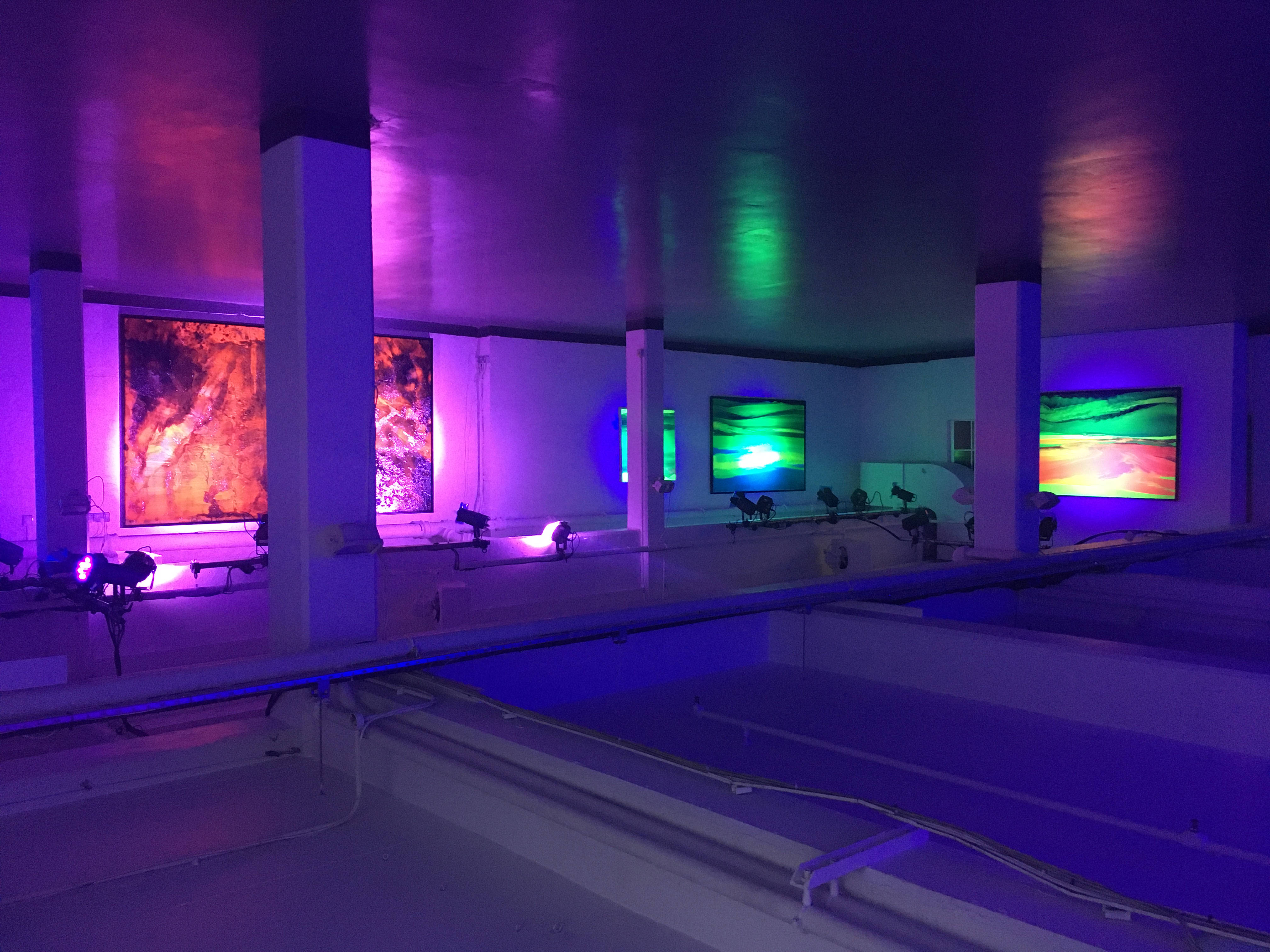 Modern event space at The Vinyl Factory Soho with vibrant artwork, ideal for exhibitions.