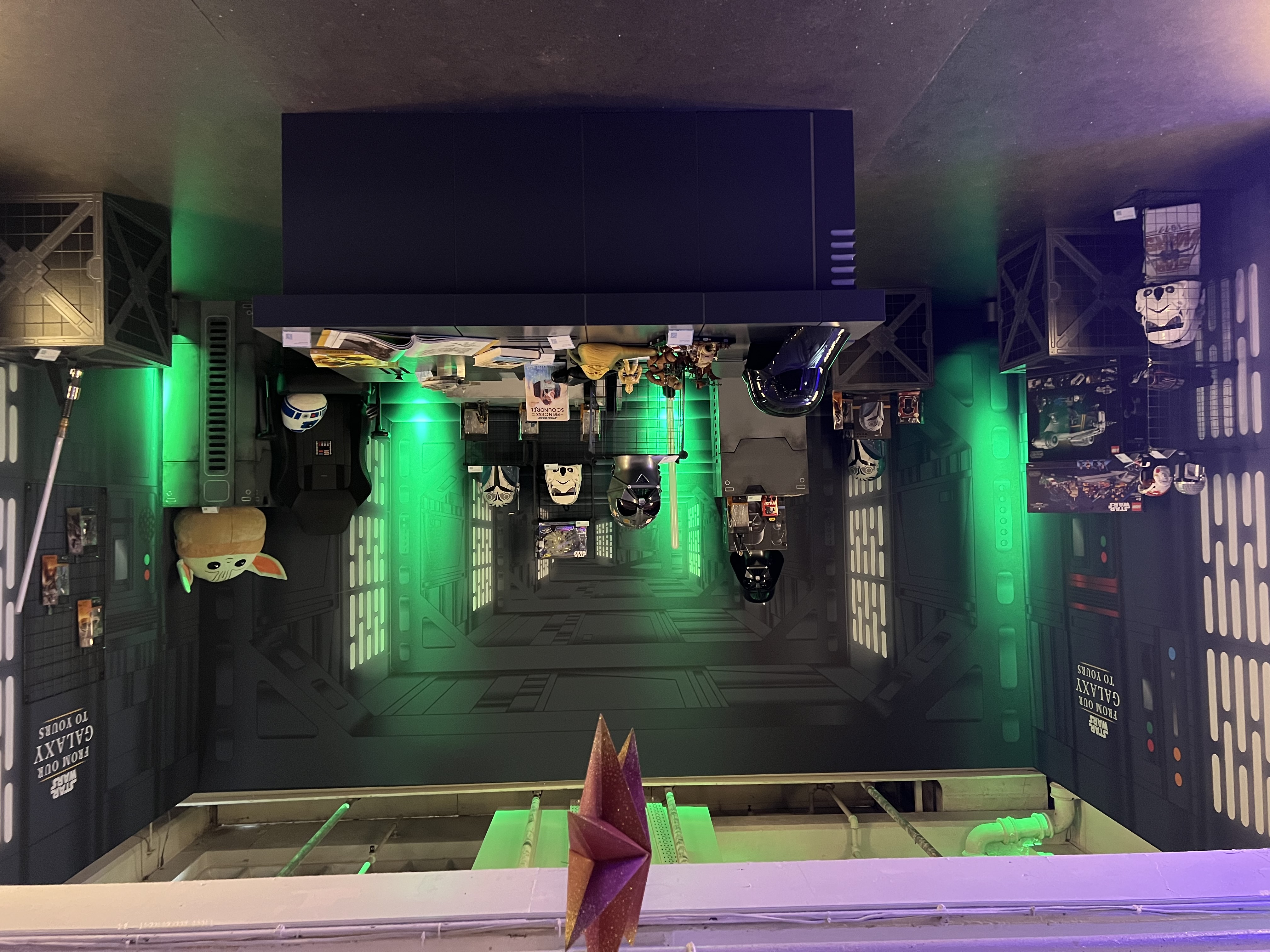 Star Wars themed event space at The Vinyl Factory Soho with green lighting and memorabilia.