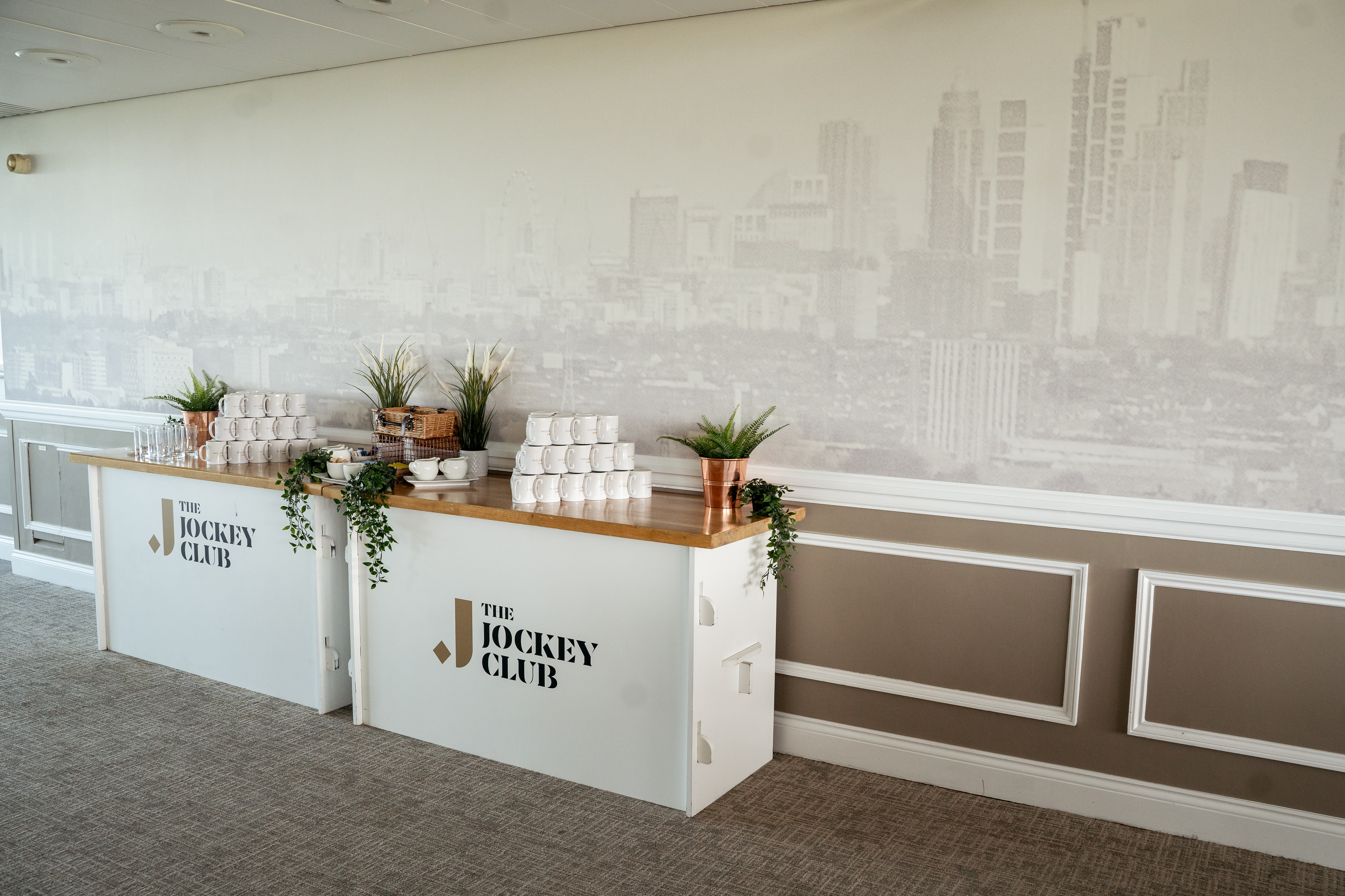 Stylish refreshment station in The Jockey Club Room, Epsom Downs Racecourse event setup.