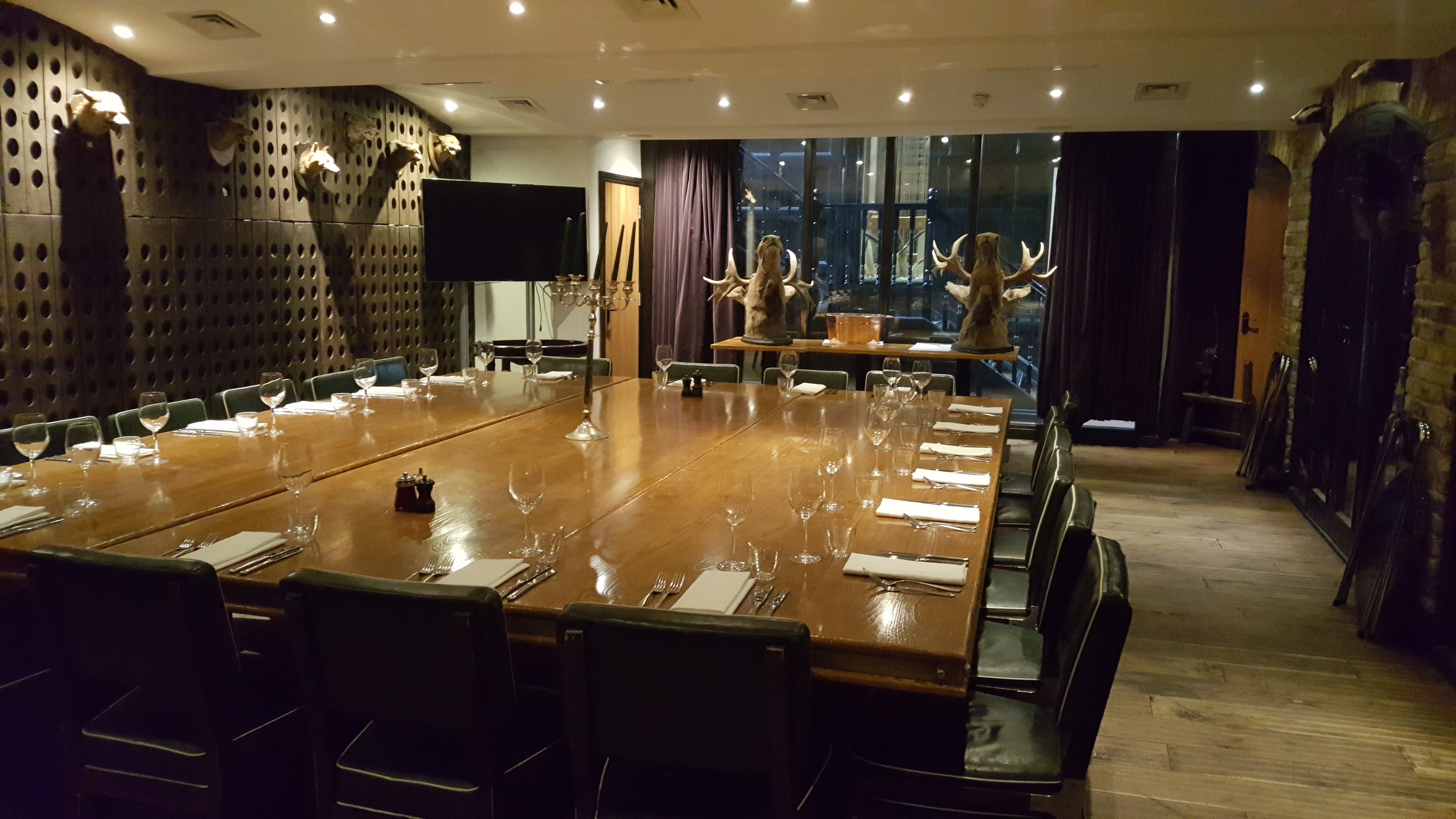 Sophisticated meeting room with elegant decor for exclusive events at The Jugged Hare.
