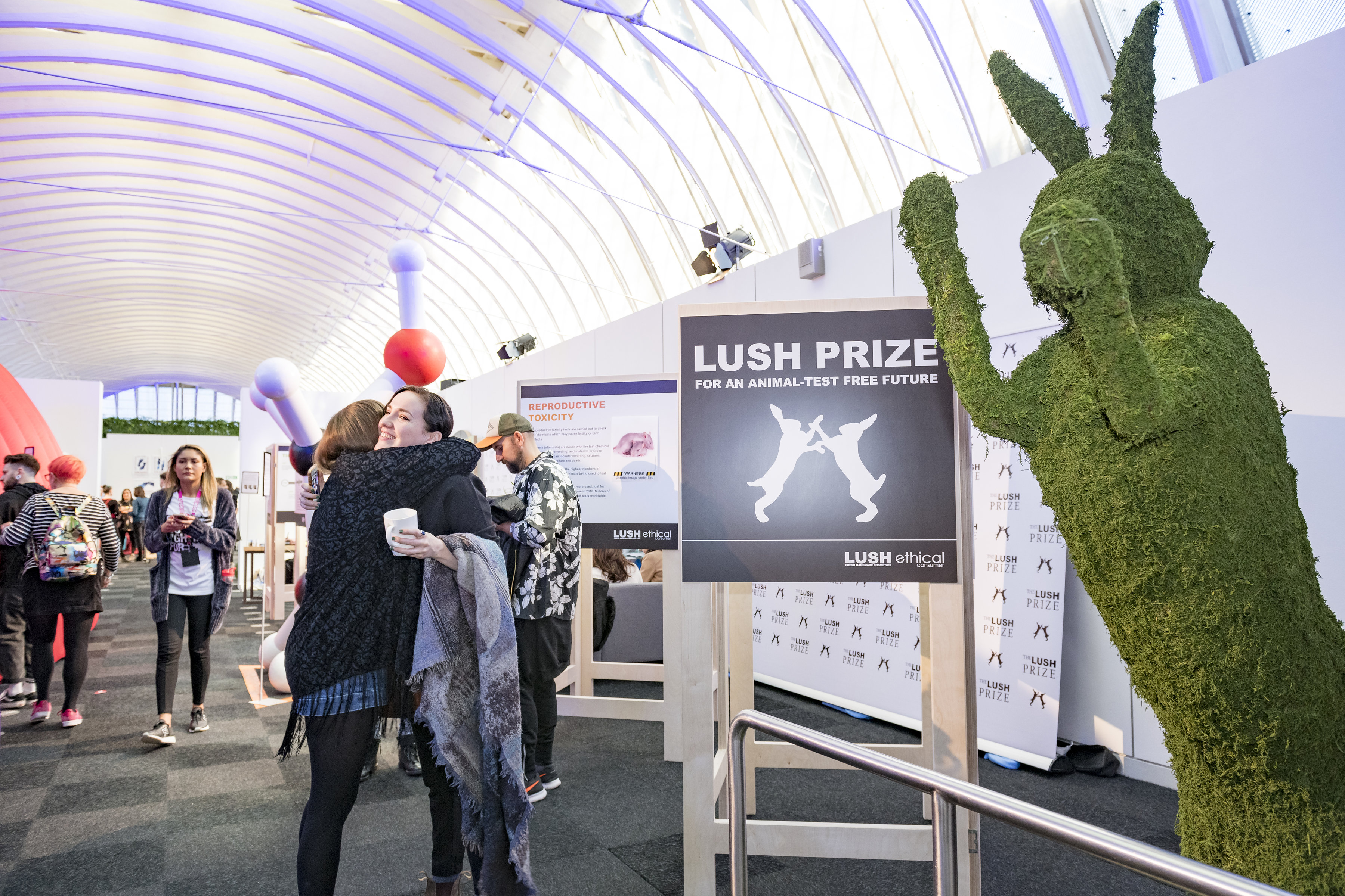 Vibrant event space at The Gallery, featuring topiary decor for networking events.