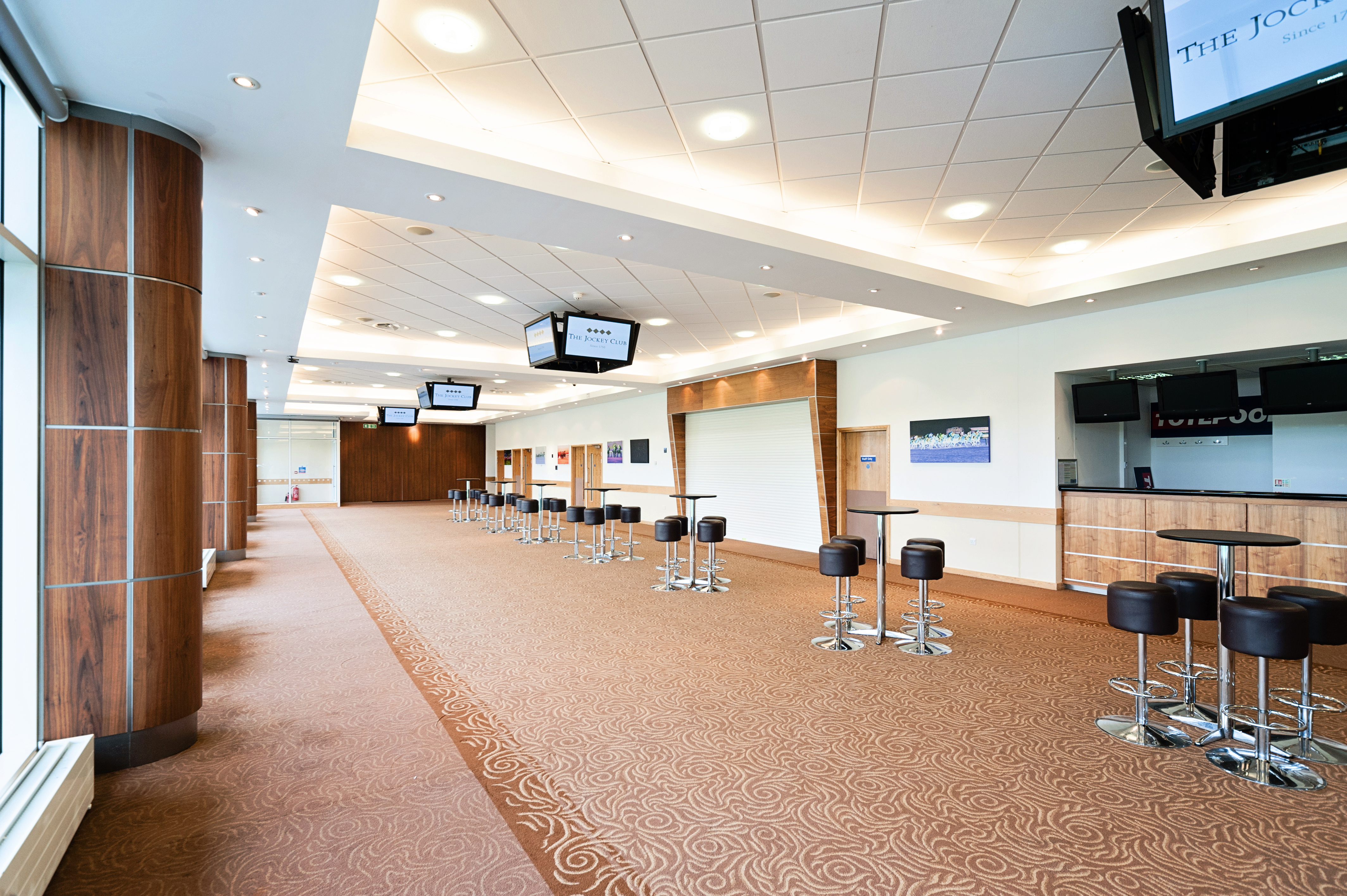 Lammtarra Suite at Epsom Downs: modern event venue for conferences and receptions.